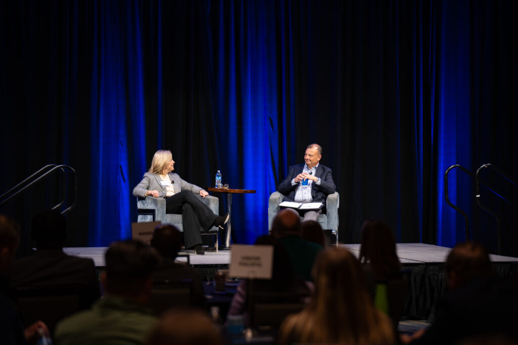 Kat Saunders and Bryan Slone on stage at the Tech Nebraska Summit